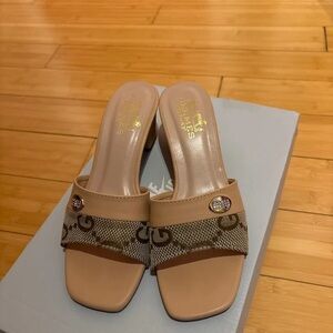 Charles & Keith Tan and Brown Patterned Mules